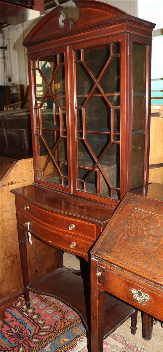 An Edwardian crossbanded mahogany display cabinet on stand, W. 2ft 6in. D. 1ft 5in. H. 6ft 4in.